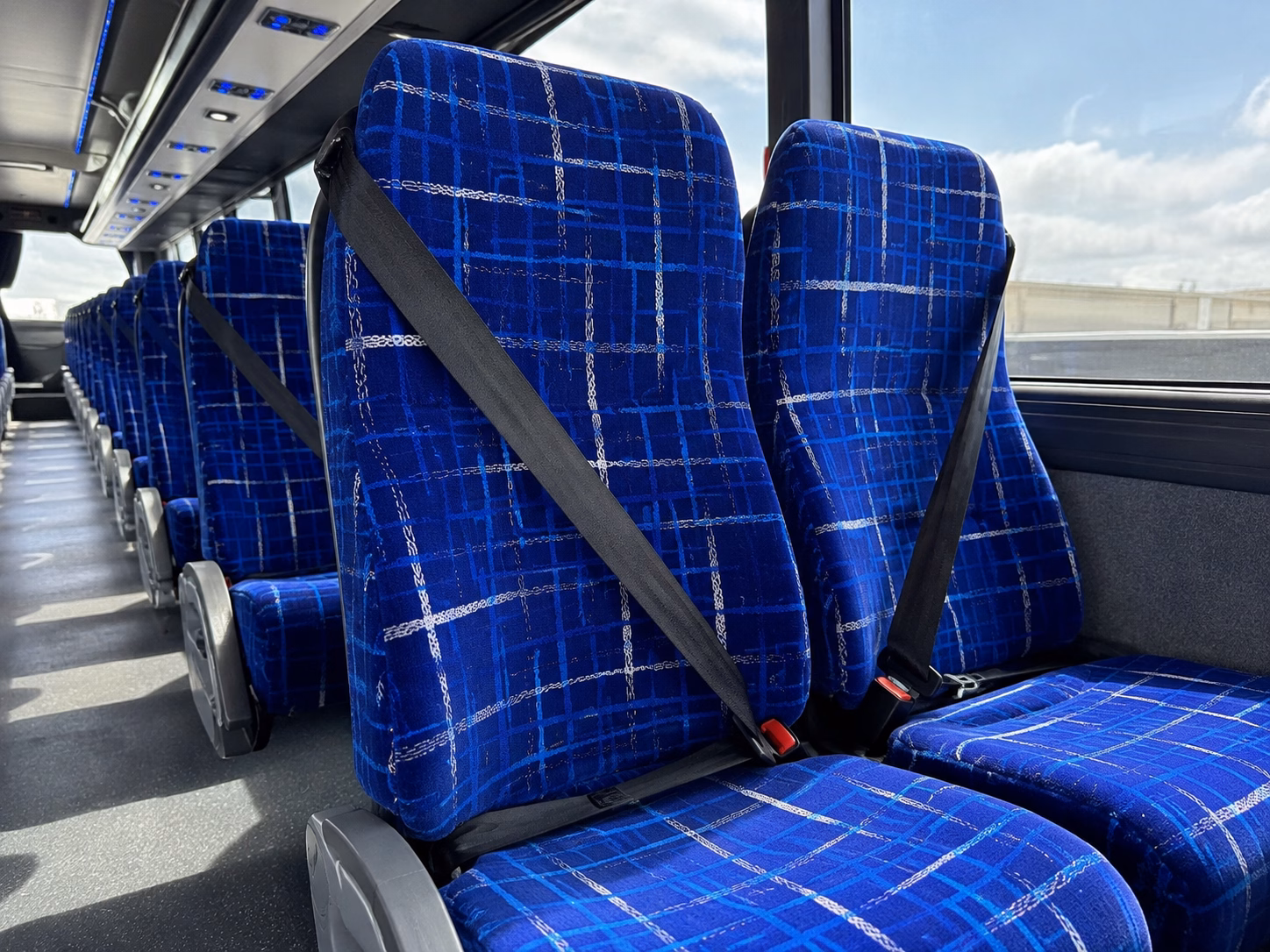 book a charter bus from gainesville to jacksonville international airport jax